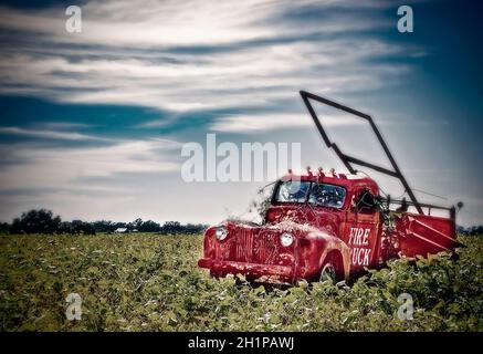 A 1940s American LaFrance fire truck sits in a field on Highway 98, Oct. 16, 2021, in Fairhope, Alabama. Stock Photo