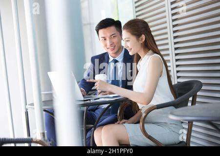 Businessmen working outdoors Stock Photo