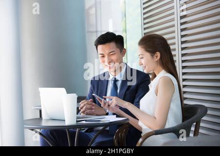Businessmen working outdoors Stock Photo