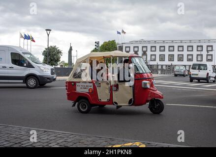 Funchal, Madeira, Portugal - April 23, 2018: Tourist electric vehicle transporting tourists in Funchal Stock Photo