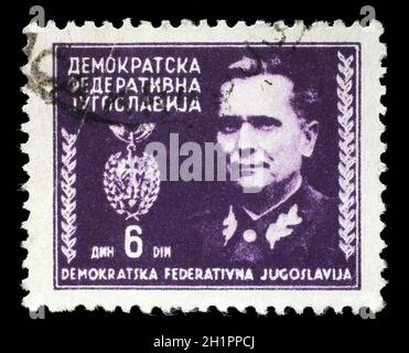 Stamp printed in Federal Democratic Republic of Yugoslavia shows Marshal Josip Broz Tito, circa 1945 Stock Photo