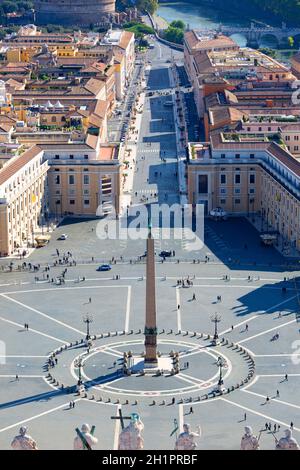 Vatican, Rome, Italy - October 9, 2020: Aerial view on Sait Peter's Square and Egyptian obelisk from dome of Saint Peter's Basilica. Few tourists due Stock Photo