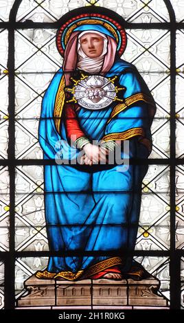 Seven Sorrows of the Virgin Mary, stained glass window in the Basilica of Notre Dame des Victoires in Paris, France Stock Photo