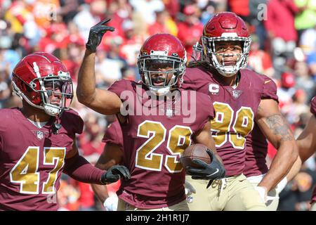 Sunday, October 17, 2021; Landover, MD, USA;  Washington Football Team cornerback Kendall Fuller (29) celebrates with  linebacker Khaleke Hudson (47) Stock Photo