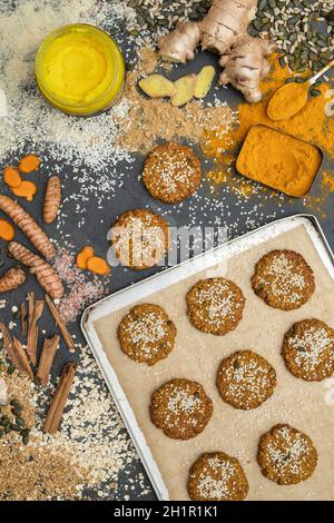 Homemade Golden Ginger and Turmeric Cookies with Ingredients Stock Photo