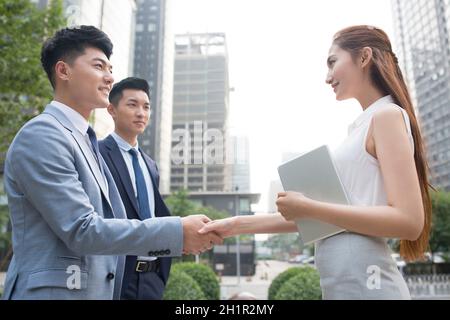 Confident businessmen shaking hands Stock Photo