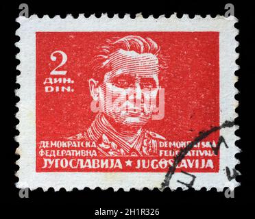 Stamp printed in Federal Democratic Republic of Yugoslavia shows Marshal Josip Broz Tito, circa 1945 Stock Photo