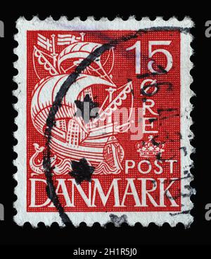 Stamp printed in Denmark shows Caravel Sailship, Series Customs Service - 350th Anniversary, circa 1927 Stock Photo