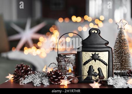 Various home Christmas or New Year decorations composition at coffee table Stock Photo