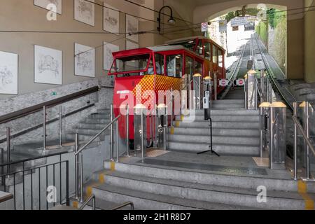 Upper city funicular line in Bergamo (Funicolare Citta Alta). Red funicular connects old Upper City and new. Bergamo (upper town), ITALY - August 19, Stock Photo