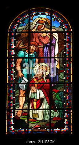 Saint Rustique, Saint Eleutherius and Saint Denis, stained glass, Notre Dame de Clignancourt church, Paris, France Stock Photo