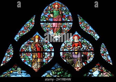 Holy bishop (Lazarus?), St. Martha, Christ, stained glass, Saint Severin church, Paris, France Stock Photo