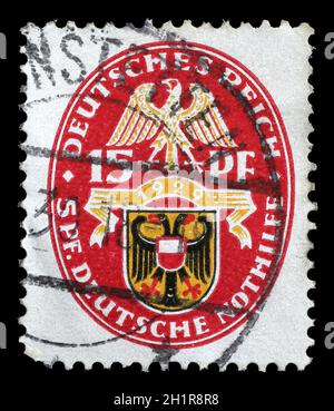 Stamp printed in the German Reich shows Coat of arms, Charity Stamps, circa 1928. Stock Photo