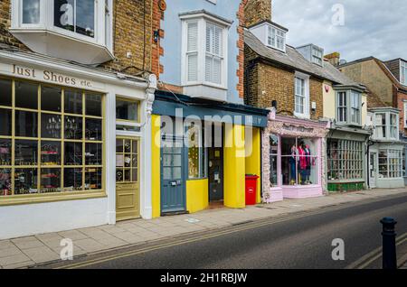 Whitsable, Kent, UK, February 2021 - Shops in Harbour Street in the seaside town of Whitstable, Kent, UK Stock Photo