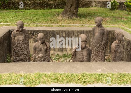 Stone Town Slave man statue in Zanzibar Stock Photo - Alamy