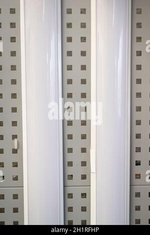 Office ceiling led lamp on exposition wall close up Stock Photo