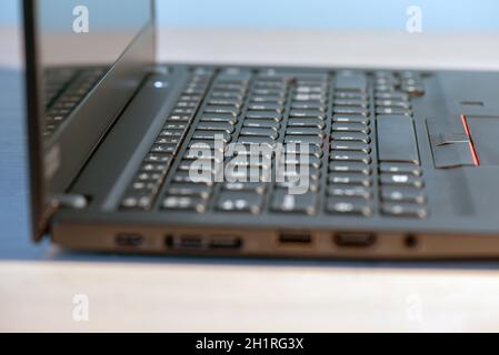 Macro shot of laptop with black keyboard. Stock Photo