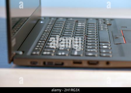 Macro shot of laptop with black keyboard. Stock Photo