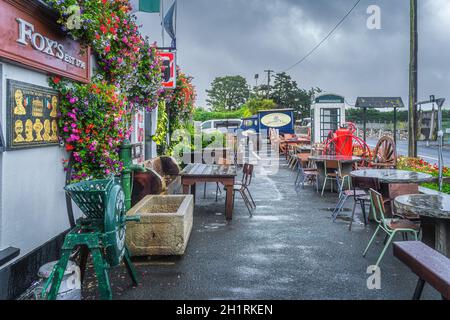 Dublin, Ireland, August 2019 Johnnie Foxs pub and restaurant established in 1798 is one of the oldest and highest pubs. Fancy chairs and tables Stock Photo