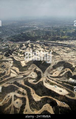 Oil pumpjacks, Inglewood Oil Field, in the middle of Los Angeles, California, USA - aerial Stock Photo