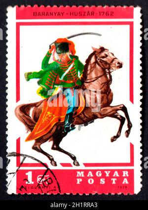 Hungary - CIRCA 1978: Hungarian postage stamp with rider on horseback. Hungarian Post. Hungarian postage stamp 1978. Magyar posta Stock Photo