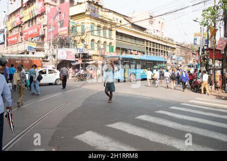 Crowded city street of Bara Bazar, a lively shopping district of Calcutta on a busy working day. Burrabazar, Kolkata West Bengal India South Asia Paci Stock Photo