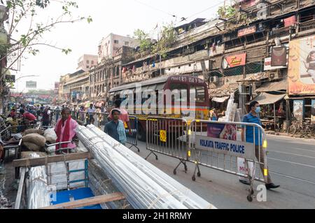 Crowded city street of Bara Bazar, a lively shopping district of Calcutta on a busy working day. Burrabazar, Kolkata West Bengal India South Asia Paci Stock Photo