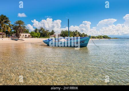 Ramena, Madagascar - December 20, 2015: Malagasy sail boat on the sea coast in a fishing village of Ramena, Madagascar. Stock Photo