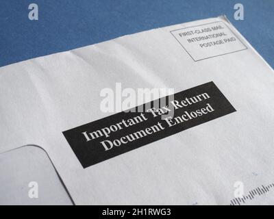 Envelope with important tax return document enclosed Stock Photo - Alamy