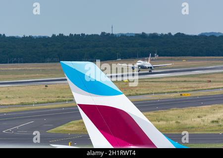 DUESSELDORF, NRW, GERMANY - JUNE 18, 2019: Eurowing plane lands at Dusseldorf International Airport Stock Photo