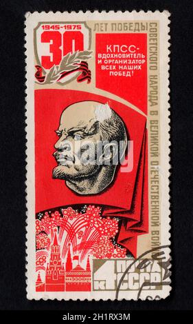 USSR - CIRCA 1975: Vintage stamp dedicated to Communist party of USSR. History of non-existent country. Historic Soviet stamp isolated Stock Photo