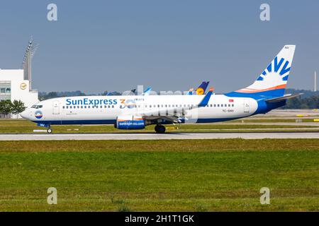 Munich, Germany - September 9, 2021: SunExpress Boeing 737-800 airplane at Munich airport (MUC) in Germany. Stock Photo