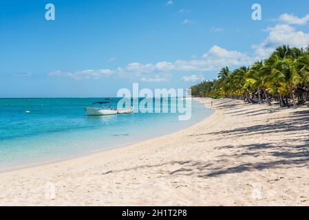 Le Morne, Mauritius - December 11, 2015: Amazing white beaches of Mauritius island. Tropical vacation in Le Morne Beach, Mauritius, one of the finest Stock Photo