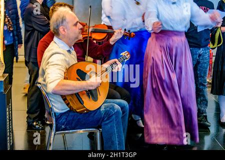 ATHENS, GREECE, DECEMBER - 2019 - Group singing tradtional greek music at acropolis museum Stock Photo