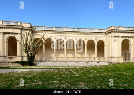 detail of historical arcade on square in front of st. Stefano church in the touristic village of Lavagna, Tigullio, Liguria, Italy Stock Photo