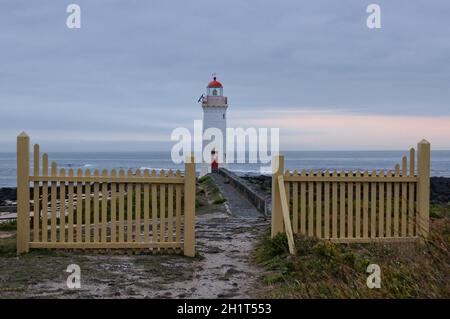 This lighthouse on Griffiths Island was built in 1859 and it is one of the main tourist attractions of the area - Port Fairy, Victoria, Australia Stock Photo