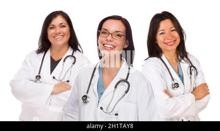 Three Hispanic and Mixed Race Female Doctors or Nurses Isolated on a White Background. Stock Photo