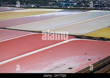 Colourful algae in salt evaporation ponds, Redwood City, San Francisco Bay, San Francisco, California, USA - aerial