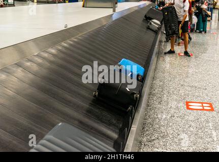MILANO, ITALY - Sep 06, 2021: A shot of luggage on the conveyor belt at Milan airport, Italy
