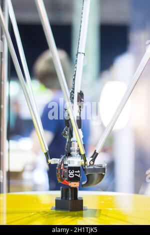 Automatic 3d printer performs a three-dimensional product creation, close-up Stock Photo