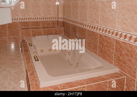 Beautiful bathroom with whirlpool bathtub and separate shower. Stock Photo