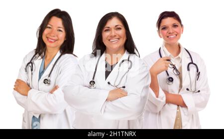 Three Hispanic Female Doctors or Nurses Isolated on a White Background. Stock Photo