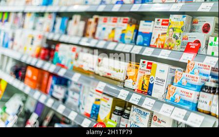 POZNAN, POL - APR 28, 2021: Pharmaceutical products for sale at a pharmacy Stock Photo