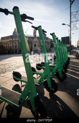 Bucharest, Romania - November 25, 2020: Illustrative editorial image of a group of Bolt electric scooters parked in Bucharest, Romania. Stock Photo