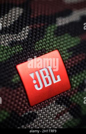 Close up shot of the JBL Logo in JBL Flip 4 Bluetooth Portable Speaker with  bokeh Christmas lights background Stock Photo - Alamy