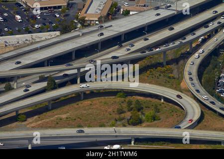 Interchange of Bayshore Freeway (U.S. Route 101), and J. Arthur Younger Freeway (SR 92), San Mateo, San Francisco, California, USA - aerial Stock Photo