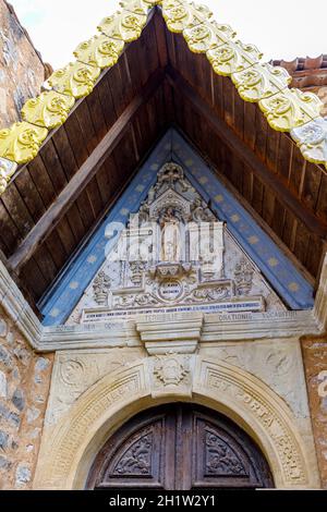 Church of Rennes le Chateau, France.  Detail of the entrance porch Stock Photo