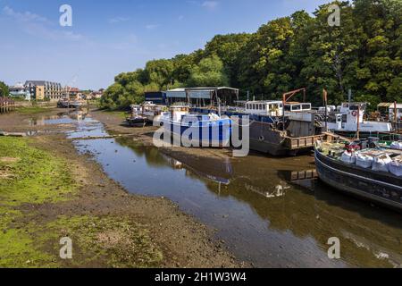 The River Thames at Isleworth at low tide,with Isleworth Ait and Wood's boatyard on the right. Stock Photo