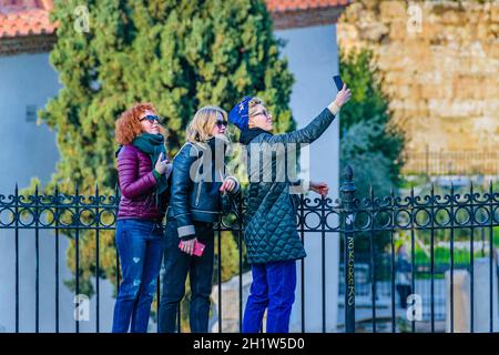 ATHENS, GREECE, DECEMBER - 2019 - Three women taking a selfie at plaka district, athens, greece Stock Photo