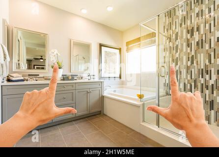 Hands Framing Custom Master Bathroom Interior. Stock Photo